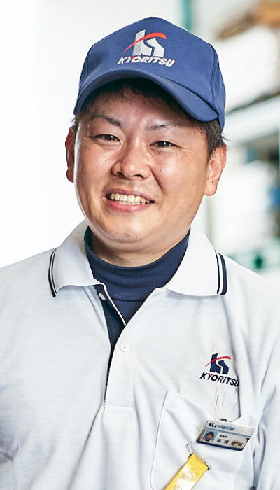 共立従業員の笑顔